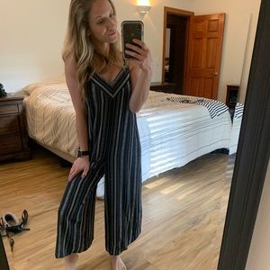 Wide leg romper with slit in legs